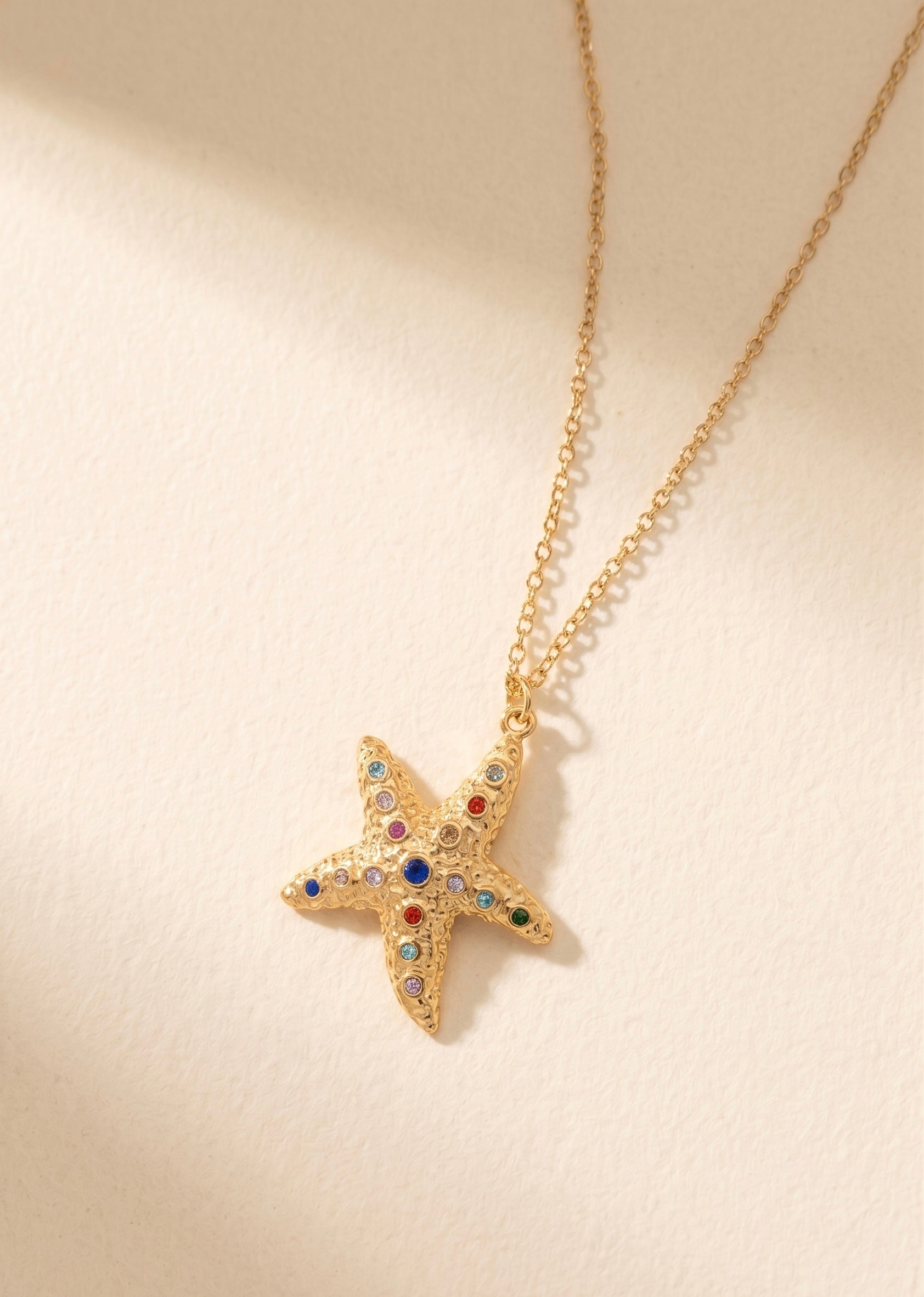 Collier étoile de mer acier inoxydable pierres multicolores