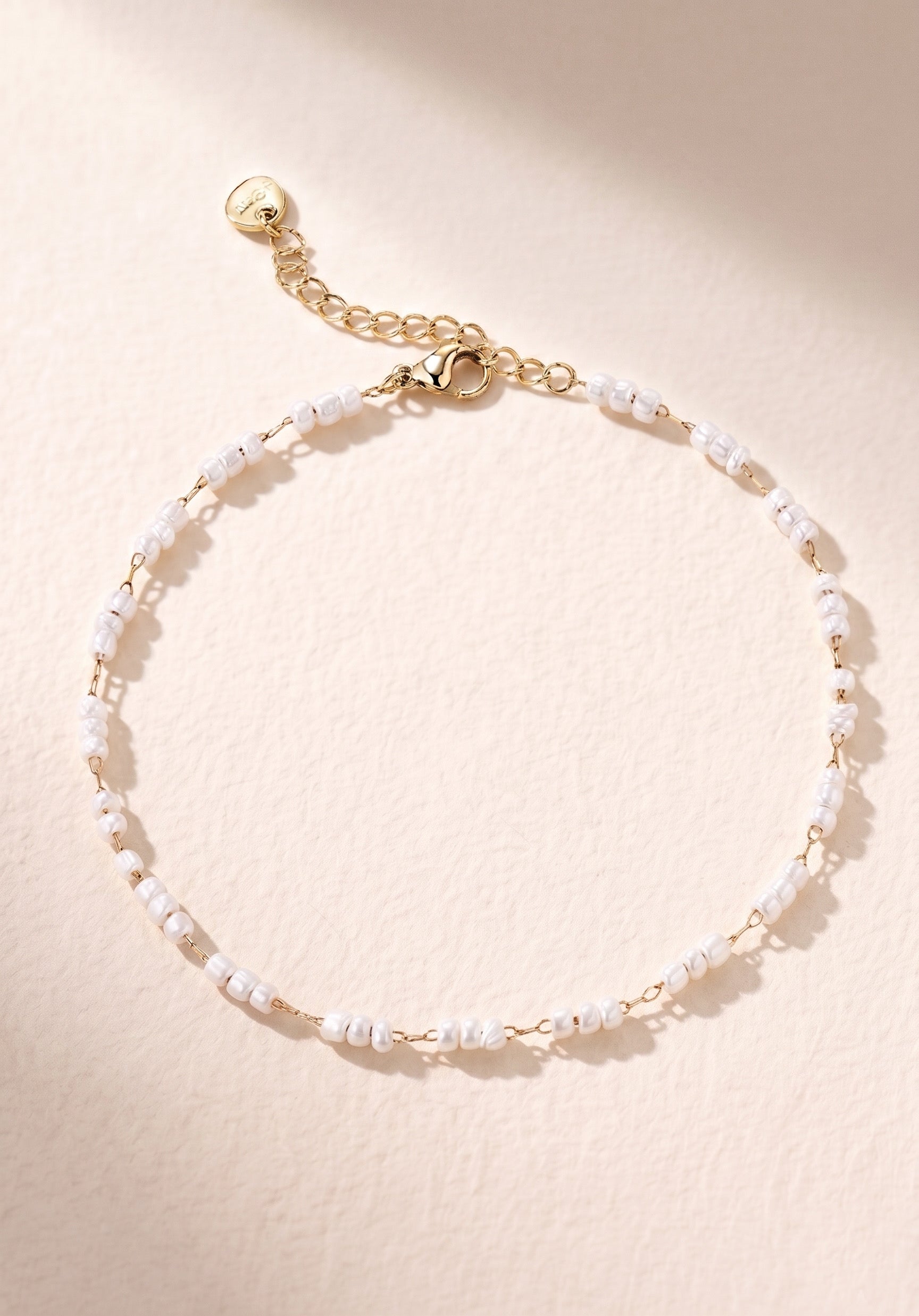 Chaîne de cheville Perles blanches